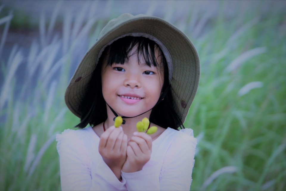 Nụ cười trên môi em